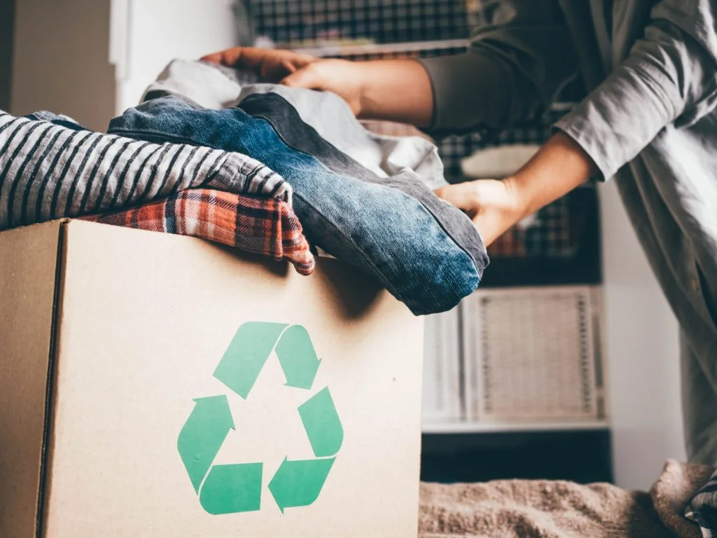 Recycle,Clothes,Concept.,Recycling,Box,Full,Of,Clothes.